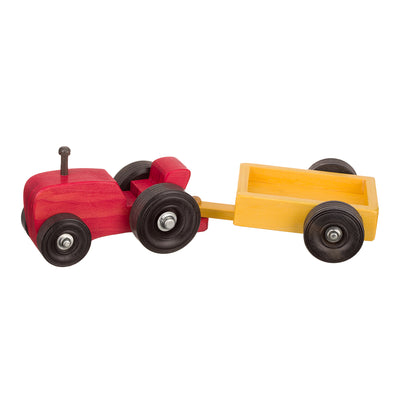Get ready for farm fun with this Small Wooden Toy Tractor and Wagon. Experience farm life as your child plays with this handmade wooden set.