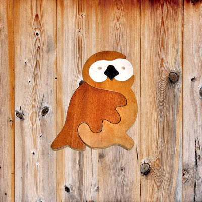 This Handcrafted Owl can be taken apart and put together as a puzzle or glued for a wall plaque.