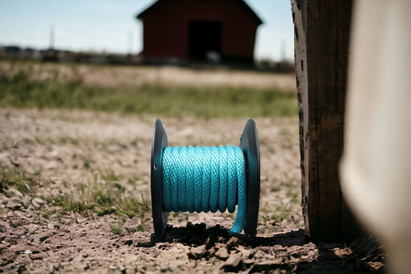 Turquoise Solid Braided Multifilament Polypropylene Rope on the farm