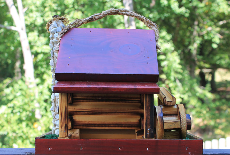 Front view of a red Grist Mill Bird Feeder