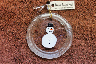 The snow man in a black hat glass ornament and suncatcher