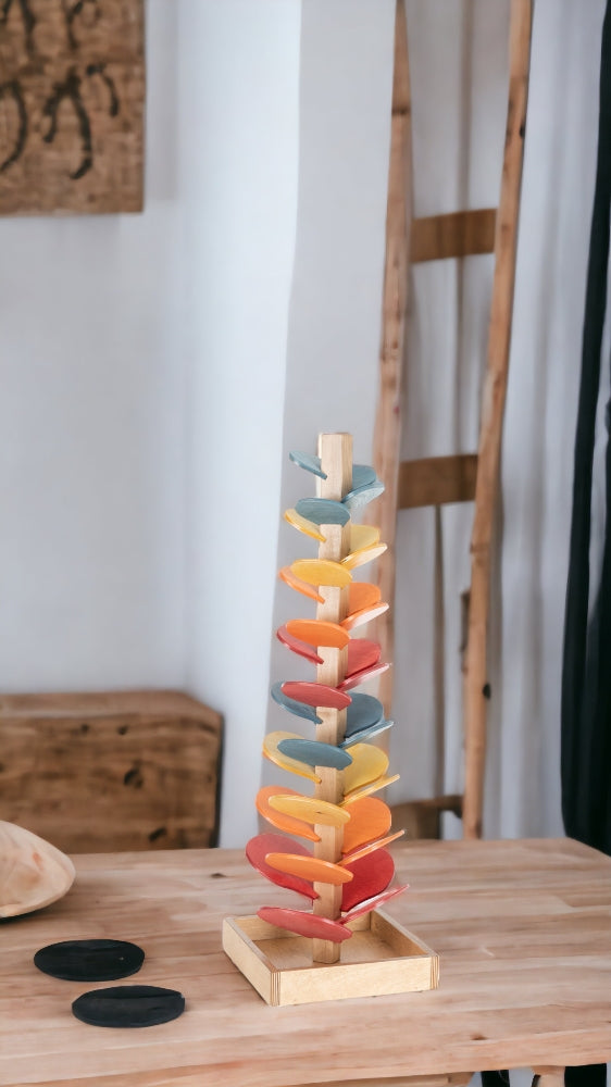 Amish Made Wooden Marble Tree on the table