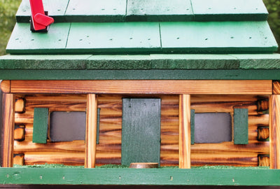 Close up of the green Amish Handmade Log Cabin Wooden Mailbox
