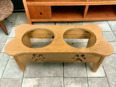 Paw Print Cut Out Design on front of Dog Feeder.