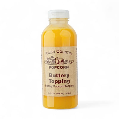 Amish Country Popcorn Buttery Topping 16 oz. bottle. Available online at Harvest Array.