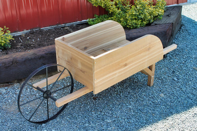 Side angle view of the Amish Old Fashioned Wooden Wheelbarrow