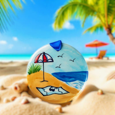 Hand Painted Beach Scene Ceramic Ornament by Nola Watkins is available in limited quantiles at harvestarray.com.