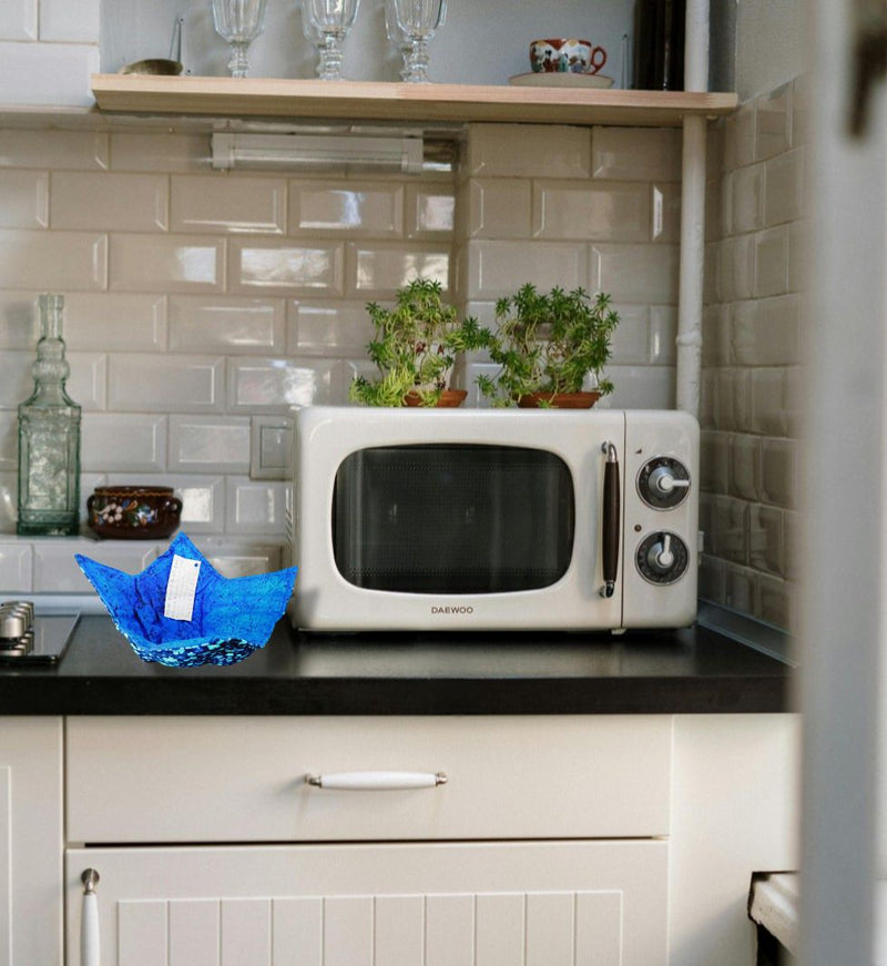 Our Reversible Bowl Cozies keep hot cereal or pasta bowls from burning your hands when placed inside the cozy.  Cozy can go inside the microwave with the bowl too. 