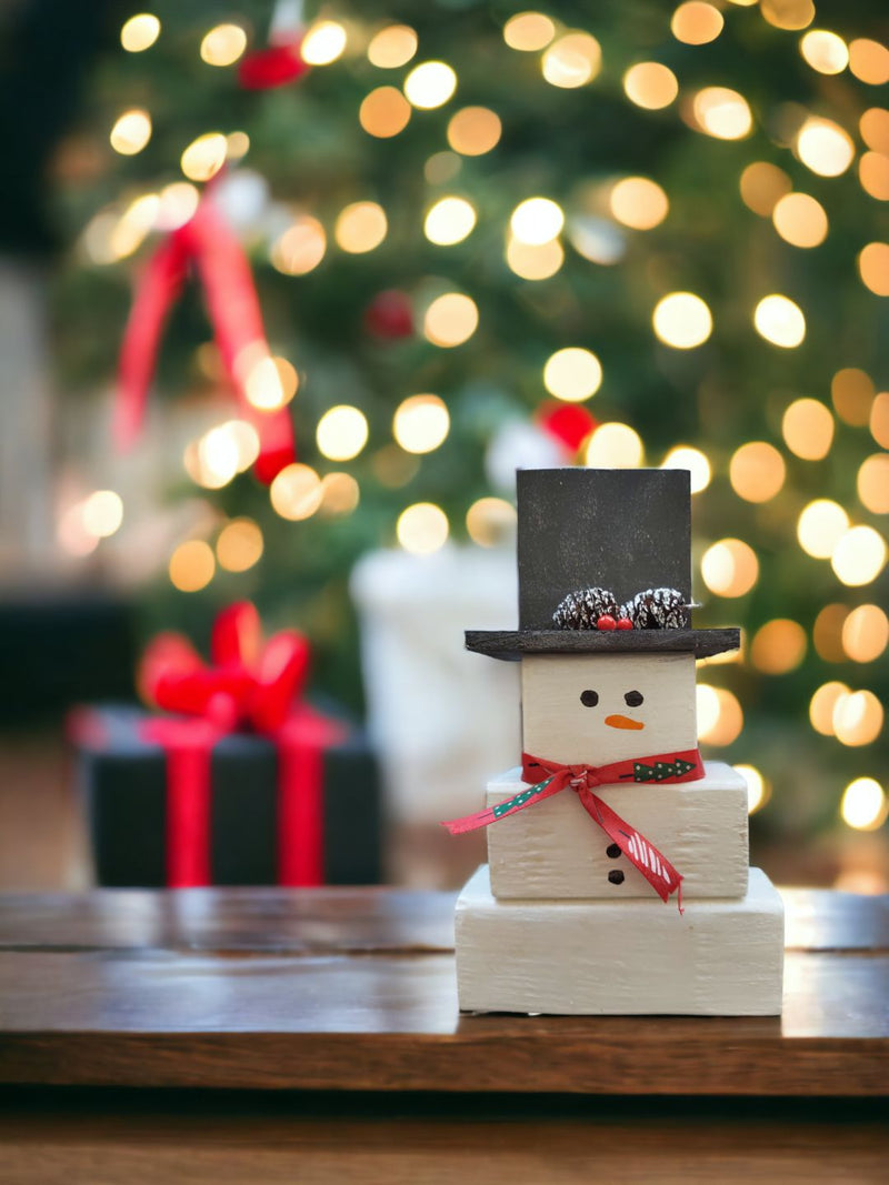 Shop unique Christmas decorations and gift ideas. This cute wooden block snowman is a perfect addition to your collection. Handcrafted in the USA.