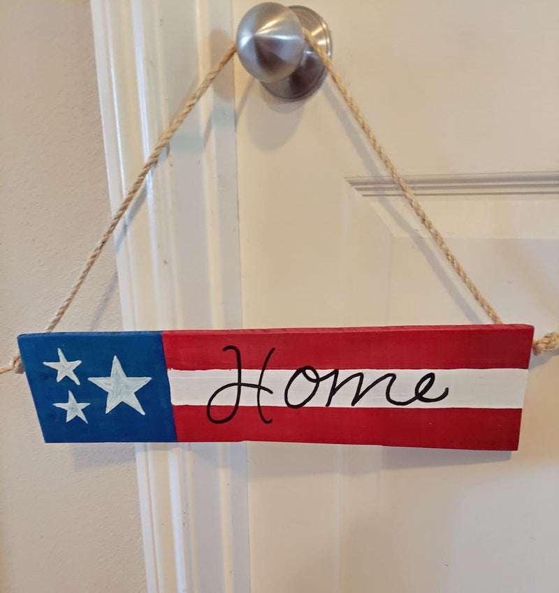 Handcrafted Home Sign painted in the stars and stripes.