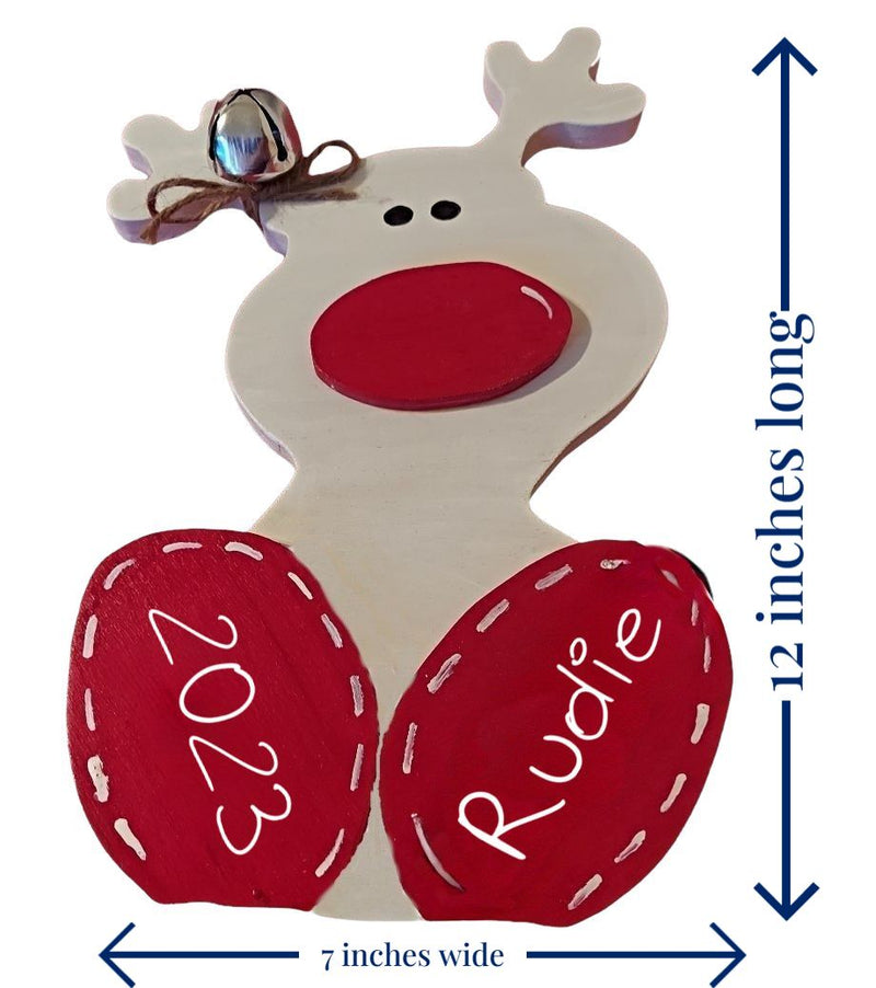 Customizable Handmade Reindeer Christmas Decoration is 7" wide and 12 inches tall.