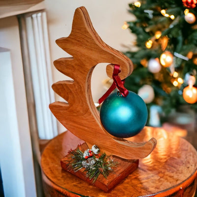 Angle view of Hand Carved Wooden Christmas Tree Ornament Display with Ornament Included