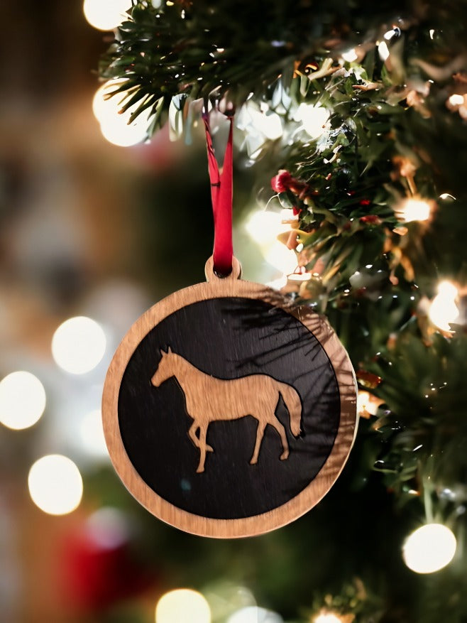 Round wooden Christmas ornament with a n engraved picture of a horse on it.  Nice gift for a horse lover from Harvest Array. 