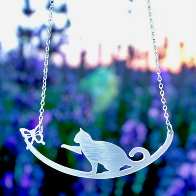 Cat lovers will adore this pretty Cat and Butterfly Stainless Steel Necklace that is handmade in America.