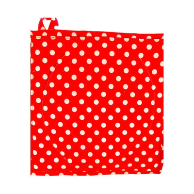 The back of the Chicken Sunshine Potholder is orange with white polka dots. This pattern carries over to the front side as the border.