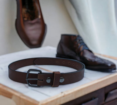 Our medium width Leather Belt at 1 1/4 inches is shown in Chocolate Brown. Made in America and available on harvestarray.com.