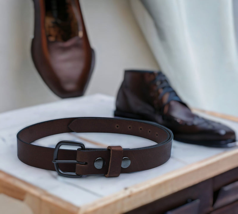 Our medium width Leather Belt at 1 1/4 inches is shown in Chocolate Brown. Made in America and available on harvestarray.com.