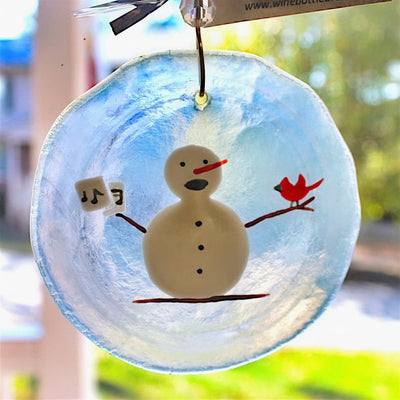 Singing Snowman Holiday Ornament and Suncatcher made from the bottom of a wine bottle!  I didn't know snowman can sing outside of Rudolph.