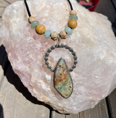 Exquisite Confetti Chrysocolla Pendant framed in Serling Silver with Aqua and Wooden Beads on a Leather Cord Necklace available at Harvest Array.