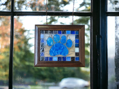 Stained glass blue paw print.  Great for the Penn State Fans