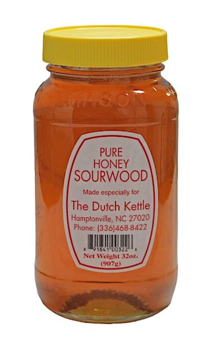 A 32 ounce glass jar of Pure Sourwood Honey from the Dutch Kettle.