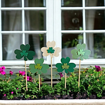 Window box display of assorted colors of Petite Shamrock Duo Garden or Plant Stakes .