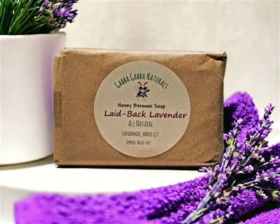 Unwind and relax in the bath while washing with Harvest Array's Laid-Back Lavender Bar Soap.