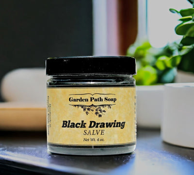 Garden Paths Black Drawing Salve is good for boils, splinters, slivers of glass and more.  4oz. jar available online at Harvest Array.