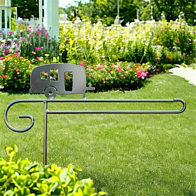 Metal Garden Flag Holder with Decorative Camper Emblem on top.