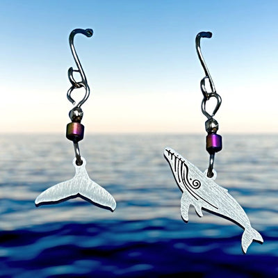 This unidentical pair of Stainless Steel Earrings has a Humpback Whale on one earring and a Whale Tail on the other.