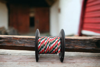 Red, Tan, White and Hunter Green Solid Braided Multifilament Polypropylene Rope at the Farm