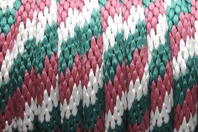 Close up of the Burgundy Silver and Hunter Green Solid Braided Multifilament Polypropylene Rope