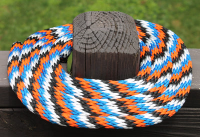 Orange, Blue, White & Black Solid Braided Multifilament Polypropylene Rope on a post