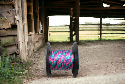 Purple, Raspberry and Teal Solid Braided Multifilament Polypropylene Rope in use on the farm