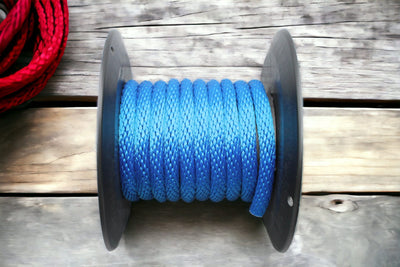 Blue Solid Braided Multifilament Polypropylene Rope in a barn