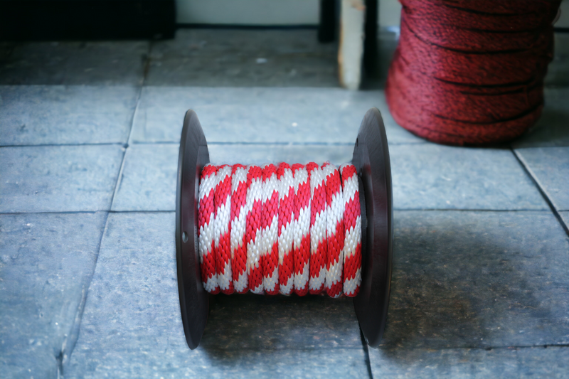 Red and White Solid Braided Multifilament Polypropylene Rope From Troyers Rope