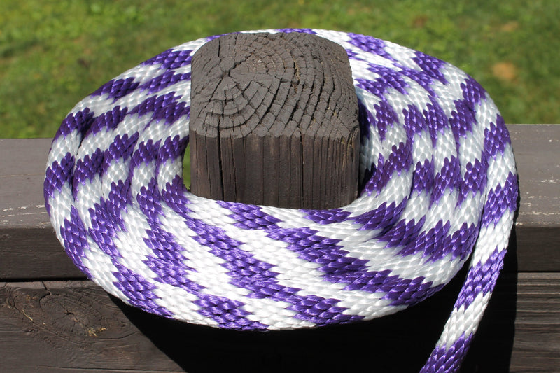 Purple and White Solid Braided Multifilament Polypropylene Rope on a post