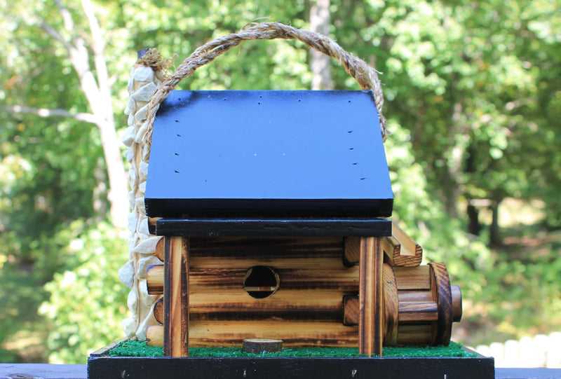 Front side of a black Grist Mill Bird Feeder