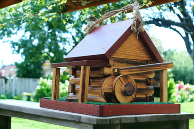 Side view of a red Grist Mill Birdhouses