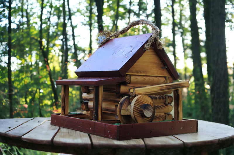Side view of the red Grist Mill Bird Feeder