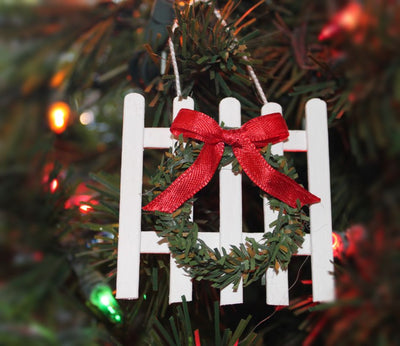 Handcrafted Mini Picket Fence with Bow Christmas Ornament on Tree.