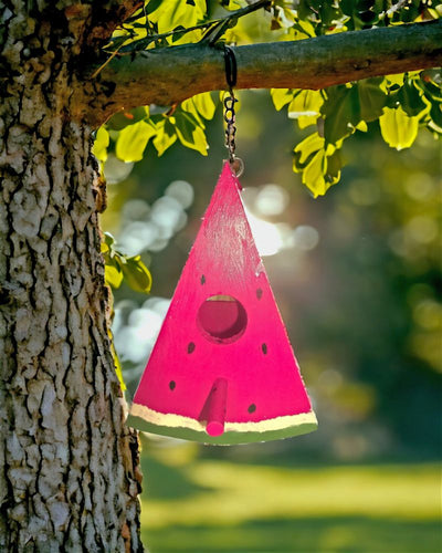 Add our taste of summer to your backyard decor and invite your feathered friends back with this adorable Pink Handcrafted Watermelon Shaped Birdhouse only available at Harvest Array!