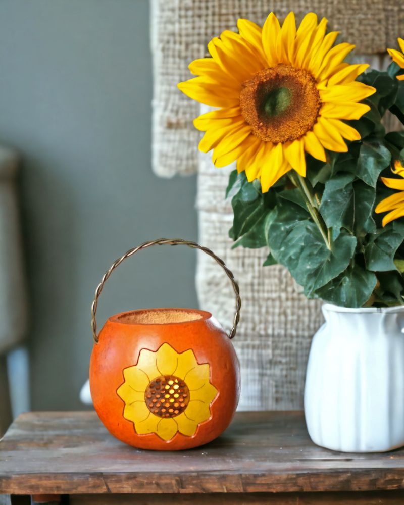 Decorate your space with our Sunflower Basket Gourd, a beautiful and unique accent to show your love for sunflowers.