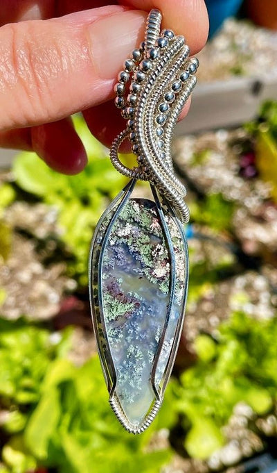 Close up of this exquisite Moss Agate Pendant