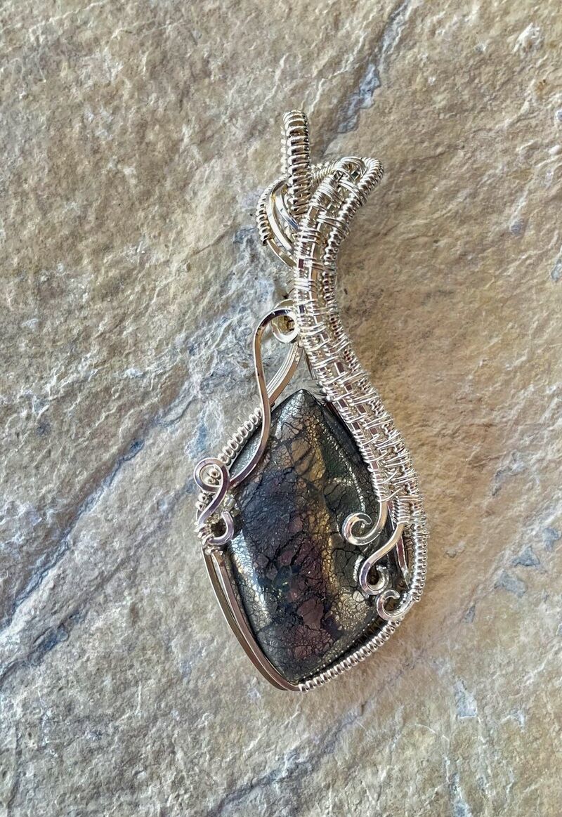 The Handmade Nipomo Marcasite Sterling Silver Wrapped Pendant is made in America.