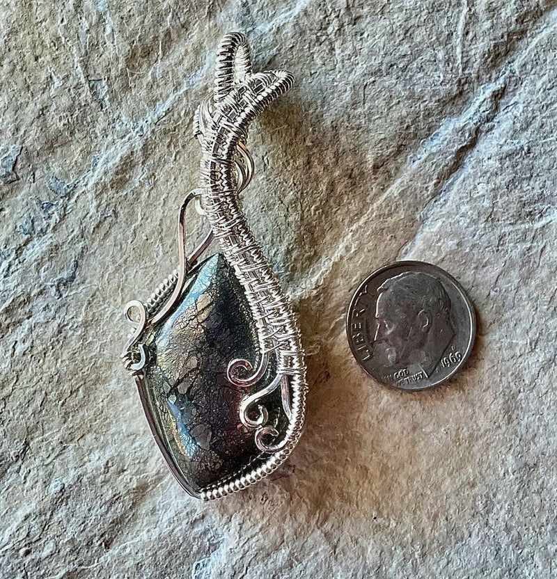 This Nipomo Marcasite  Cabochon Pendant is 2.5 inches long x 1.0 inch wide.