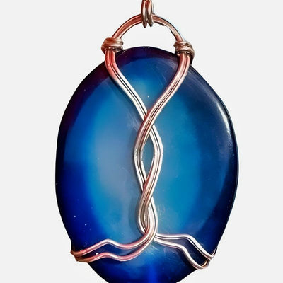 Close up of Fire Blue Agate Pendant