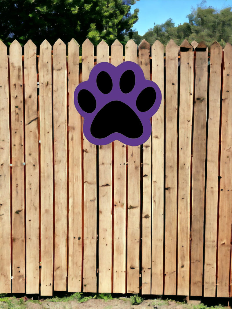 Purple and black door hanger shows that they can be hung on a wooden fence to spruce up your sports party decorations.