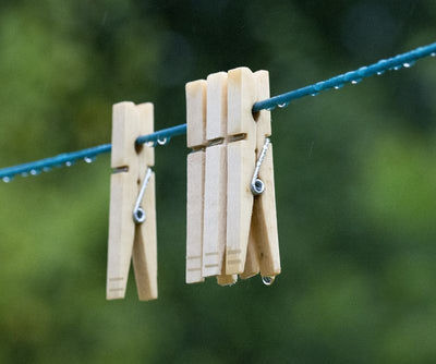 Amish Made Wooden Clothespins will not rust if left out on the line in the rain. Available at Harvest Array.