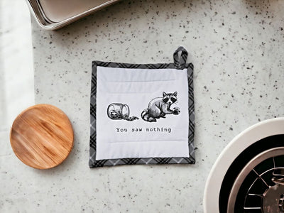 Shop Harvest Array for cute, embroidered potholders with humorous sayings like this one with "You saw nothing" and a picture of a raccoon stealing a cookie from the cookie jar!